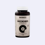 Biobizz | Microbes organic microbiome booster for healthy plants in a dark bottle.